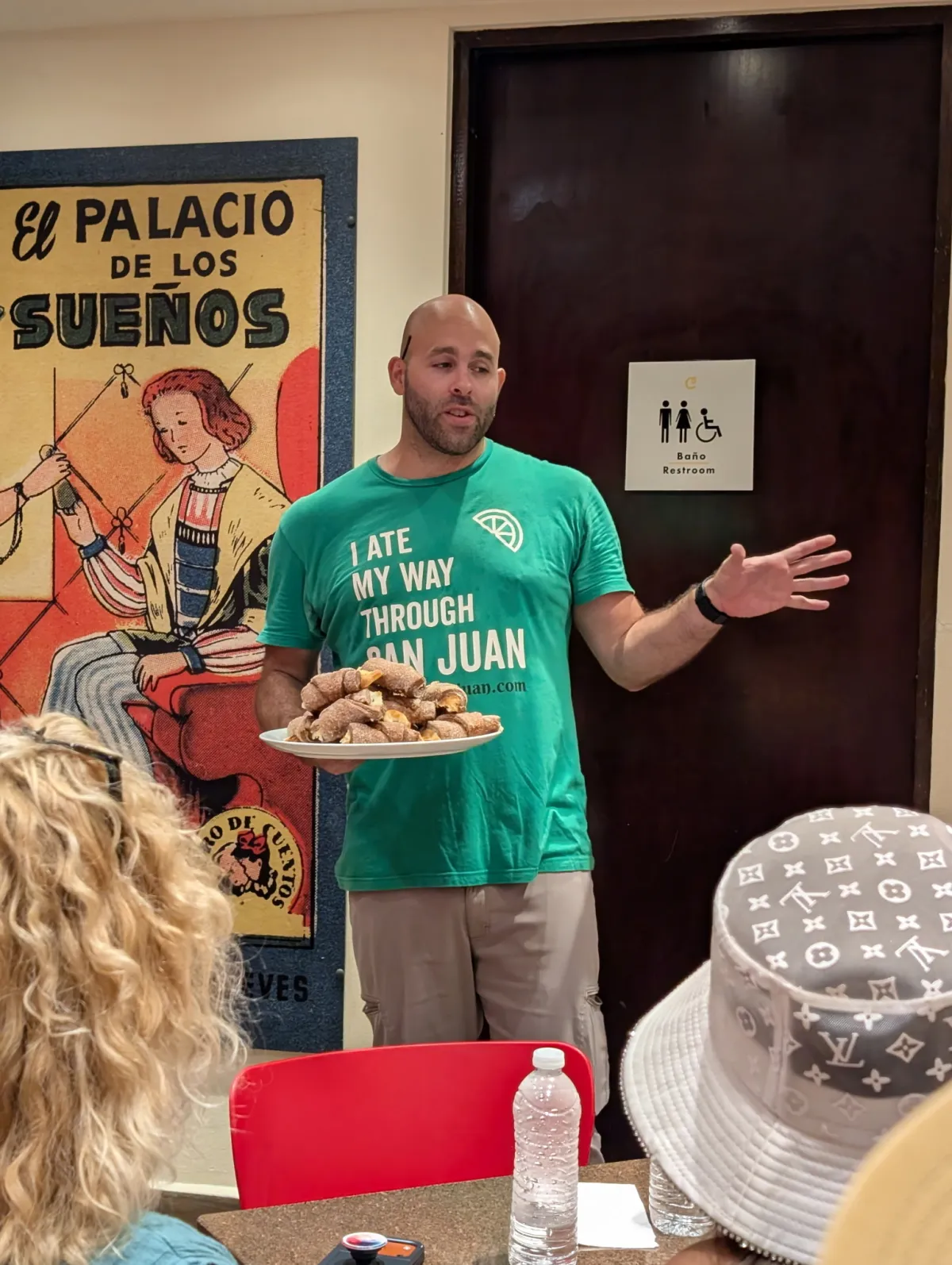 Danny from Flavors of San Juan Food Tours leading a group through Puerto Rico